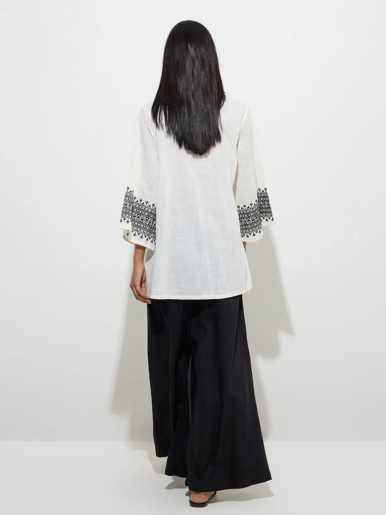 Utsa Off-White Embroidered Cotton Kurti